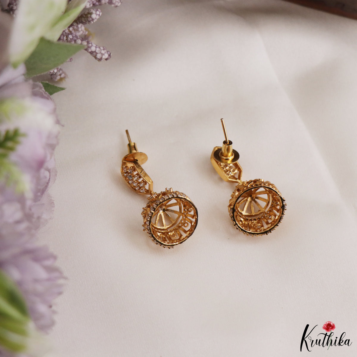 Simple White AD Gold tone Floral Jhumkas E1237