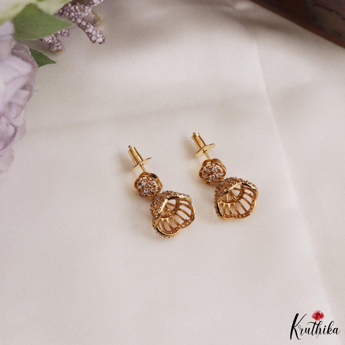 Simple White AD Gold tone Floral Jhumkas E1238