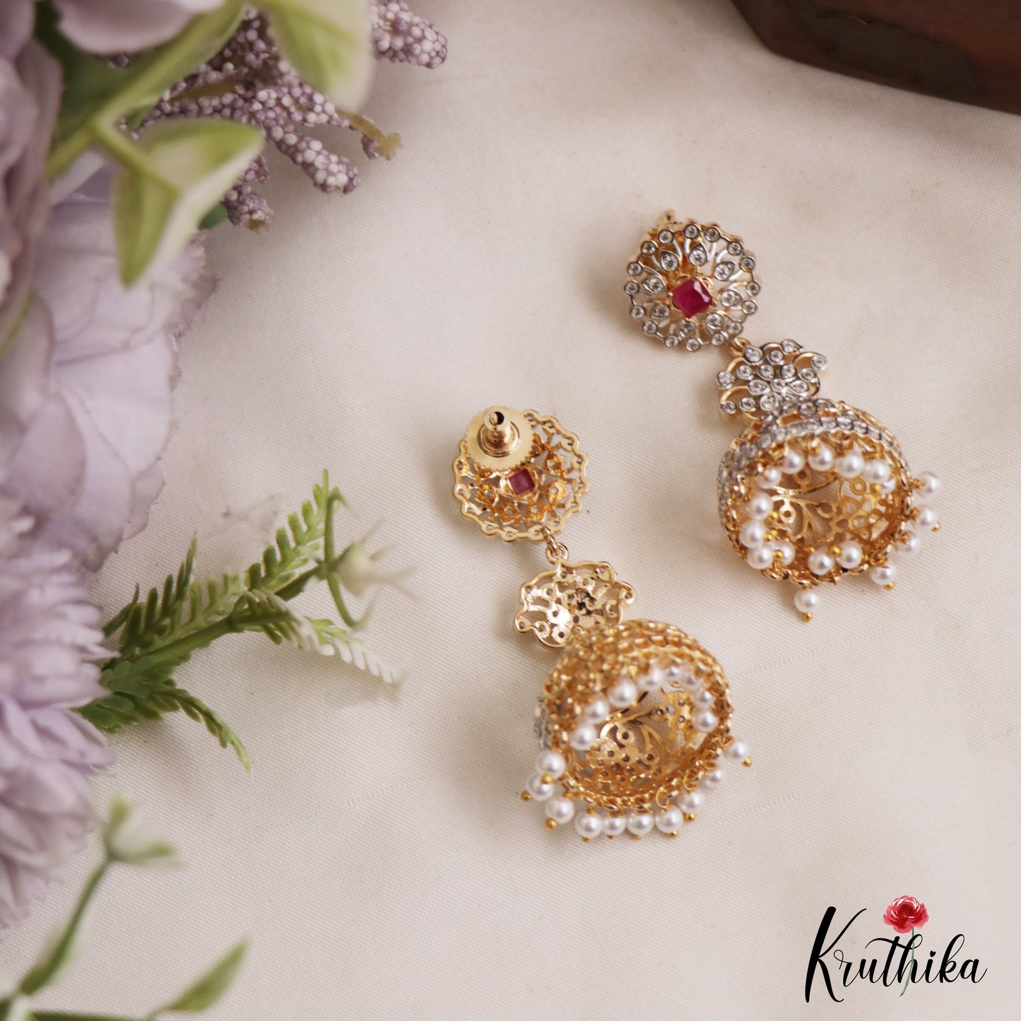 Elegant Floral Motifs AD Jhumkas With Pearl Drops E1098 (Available In 3 Colors)