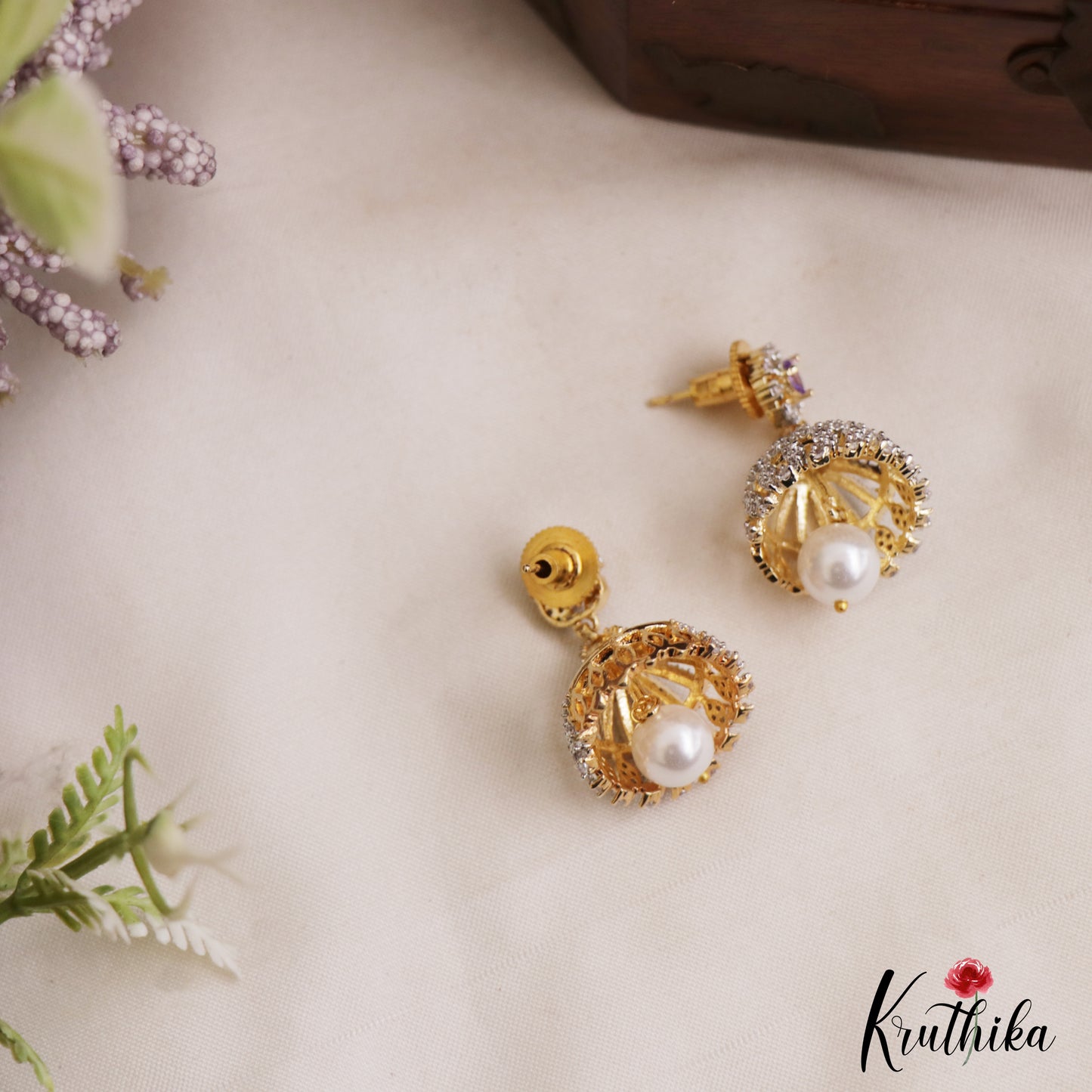 Pretty Teardrop Motifs AD Jhumkas With Pearl Drop E1097 (Available In 3 Colors)