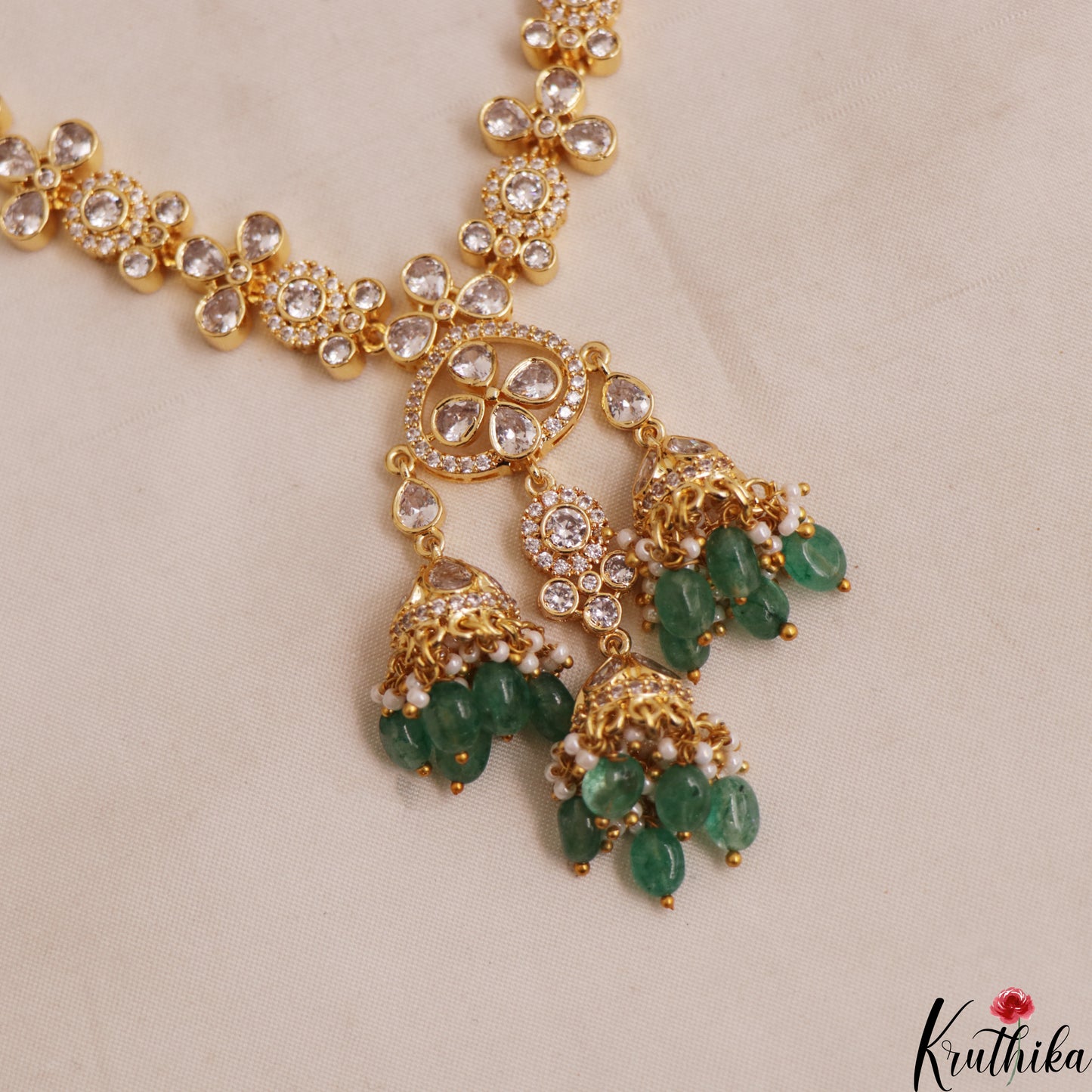 Sparkling Floral Motifs Gold-Tone CZ Necklace With Green Bead Drops NC3017