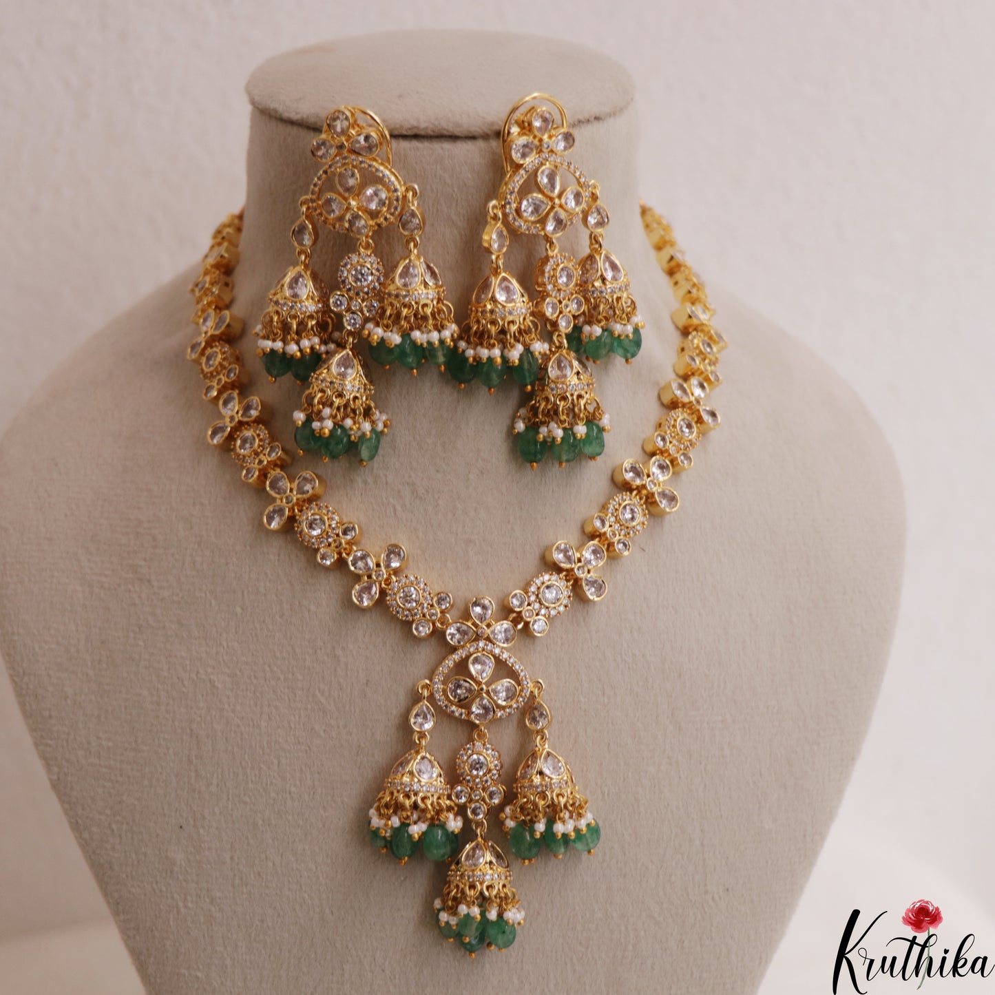 Sparkling Floral Motifs Gold-Tone CZ Necklace With Green Bead Drops NC3017