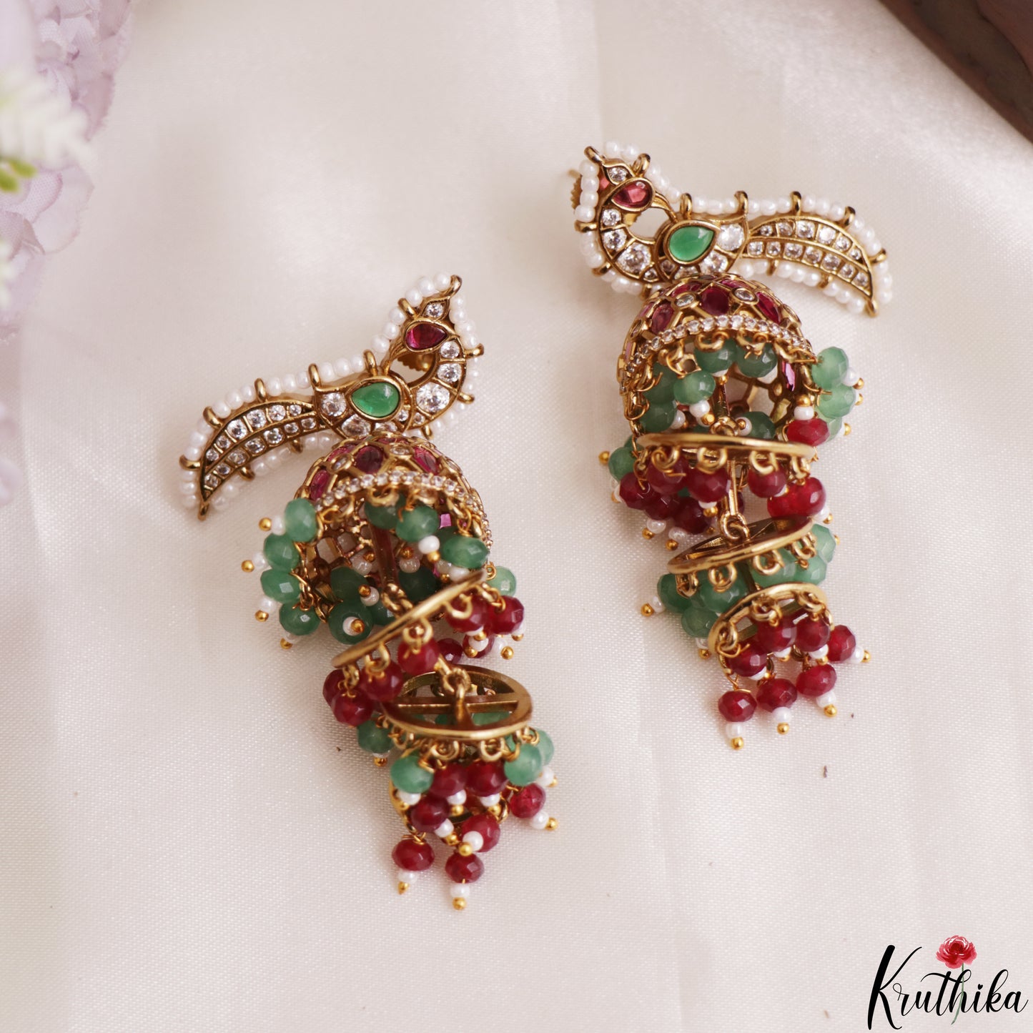 Stunning Pearl Border Peacock Motifs Jhumkas With Pearl Bead Drops E1221 (Available In 2 Colors)