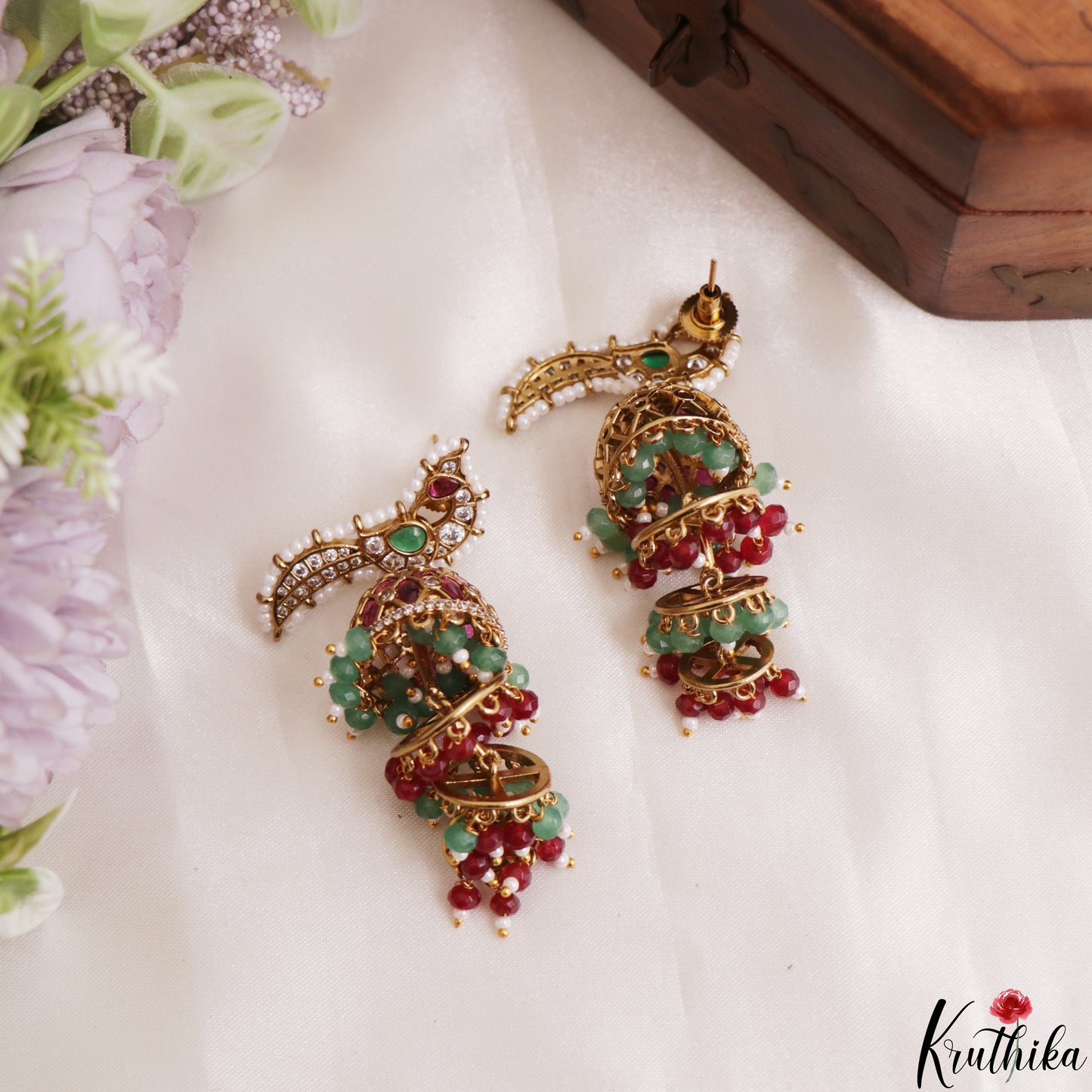 Stunning Pearl Border Peacock Motifs Jhumkas With Pearl Bead Drops E1221 (Available In 2 Colors)