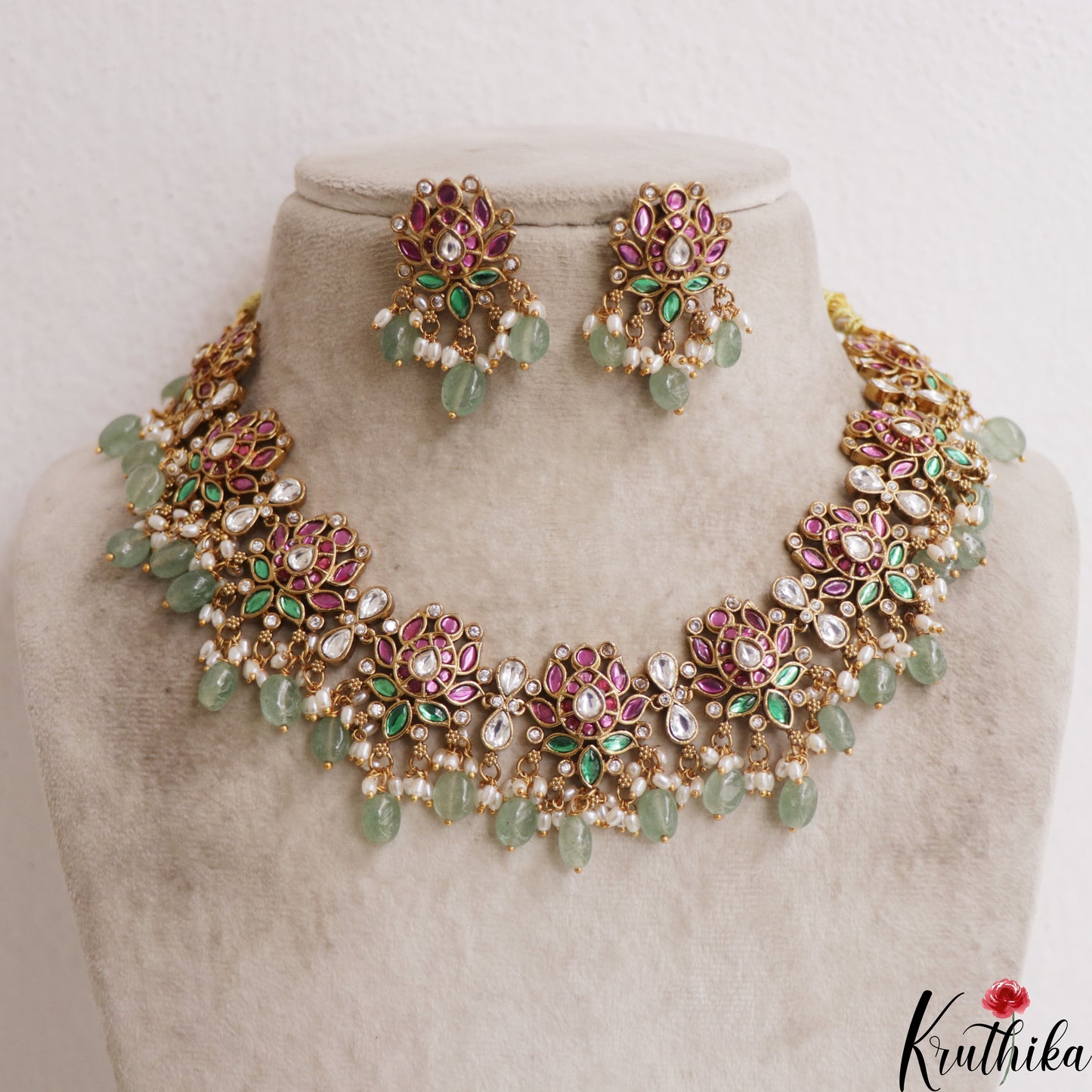 Trendy Lotus Motifs Jadau Necklace With Mint Green Beads LH2105