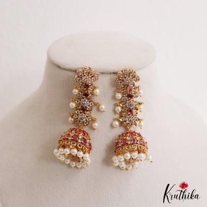 Sparkling Floral Motifs AD Jhumkas With Pearl Drops E1107 (Available In 4 Colors)