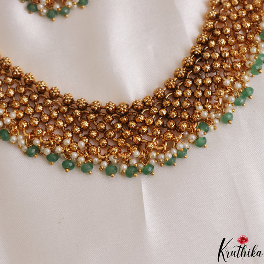 Trendy Antique Golden Bead Choker With Green Bead Drops NC3117