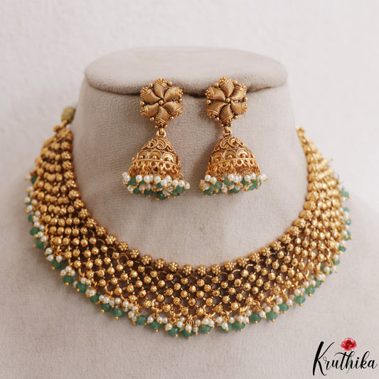 Trendy Antique Golden Bead Choker With Green Bead Drops NC3117