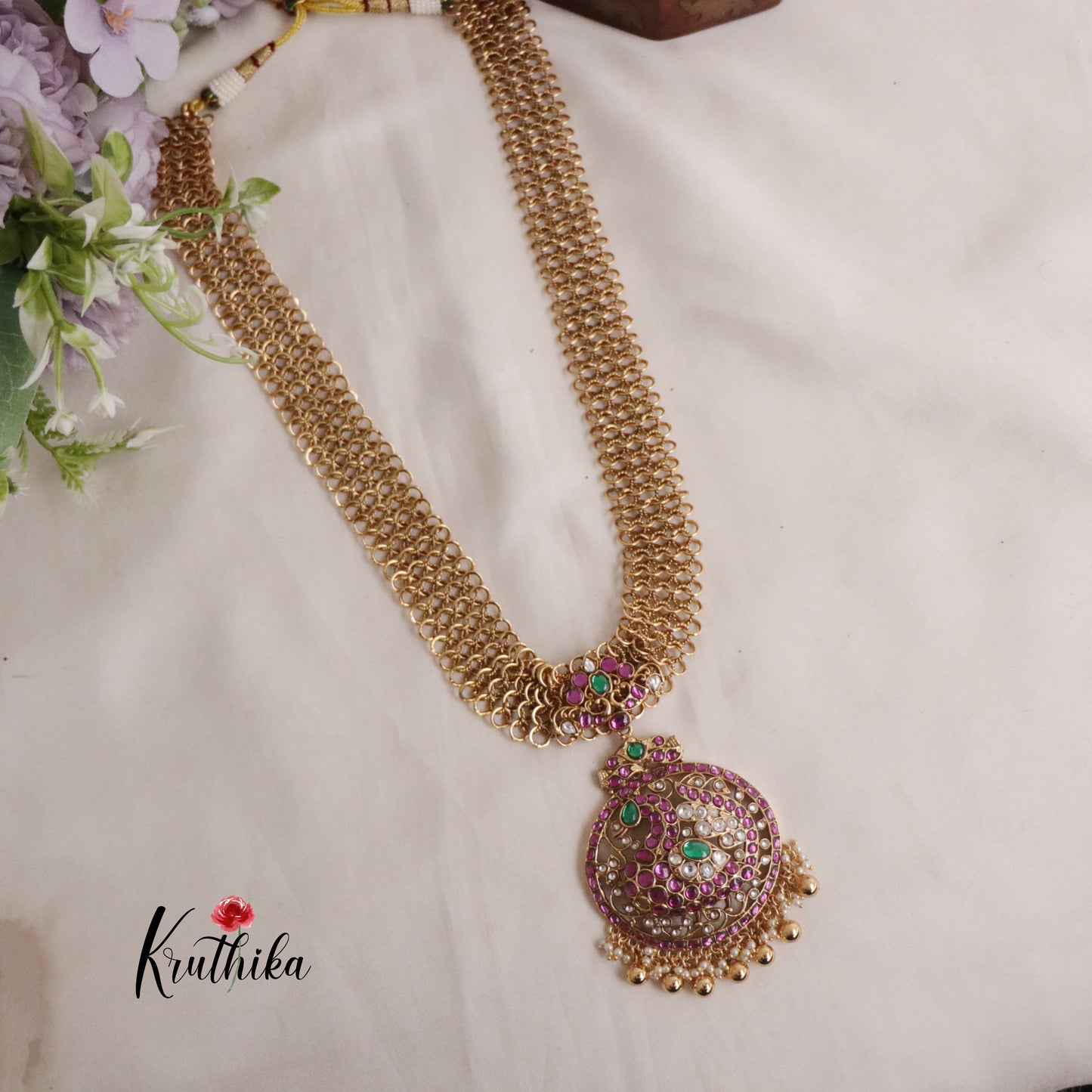 Classic Jadau Peacock Pendant Necklace with Golden Loop Chain Design and Jhumkas LH1935