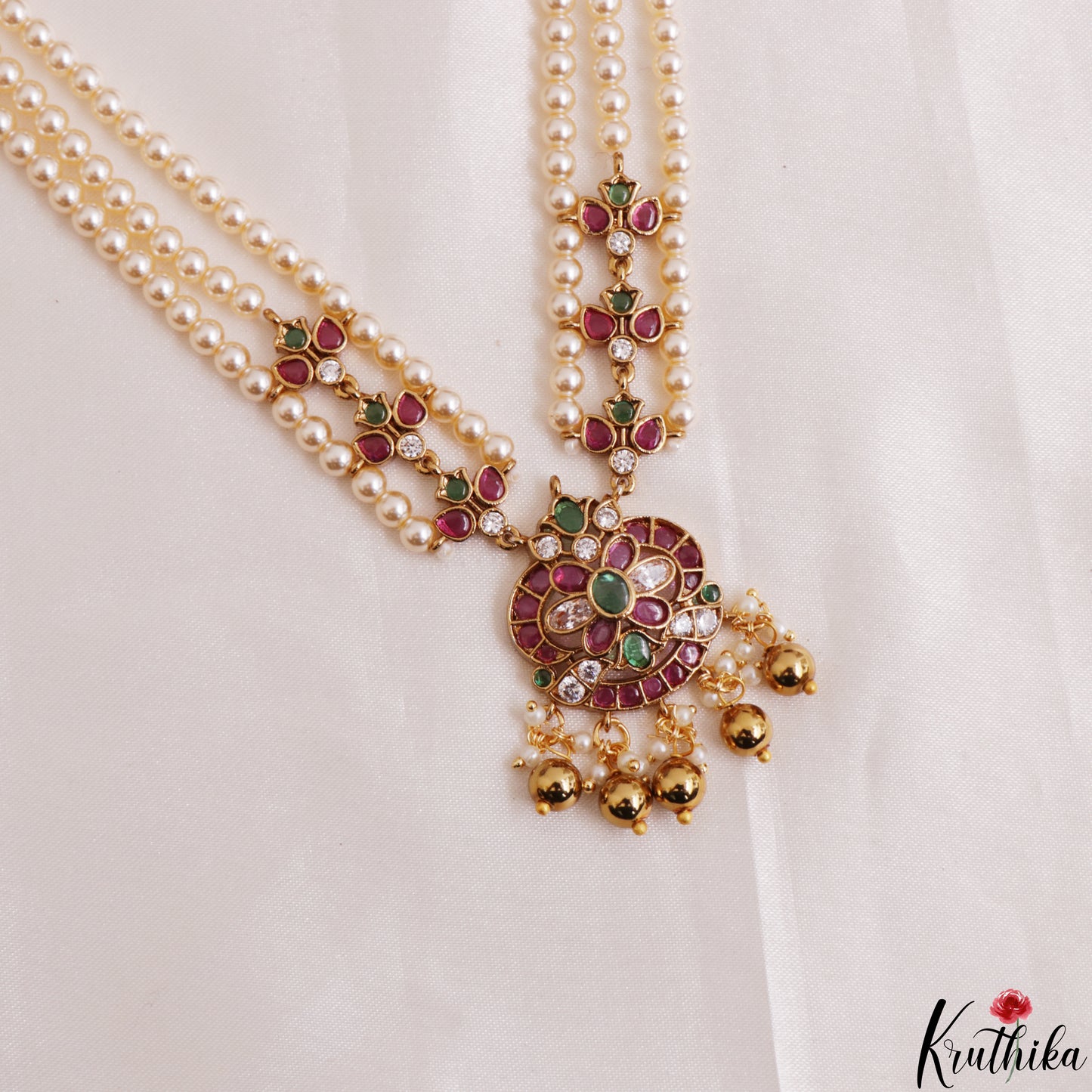 Trendy Multi Strand Pearl Chain With Kemp Floral Pendant LH2198