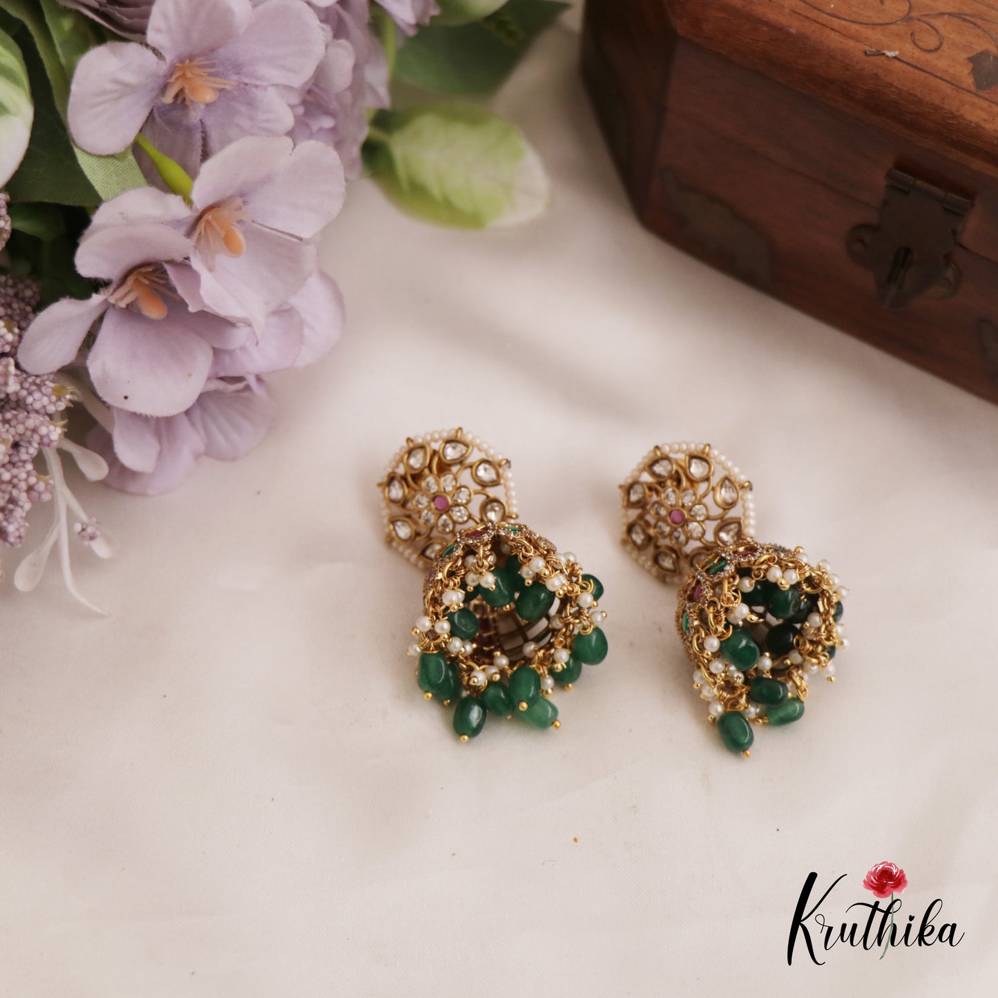 Sparkling Pearl Border Floral Motifs Jhumka With Bead Drops E986 (Available In 2 Colors)