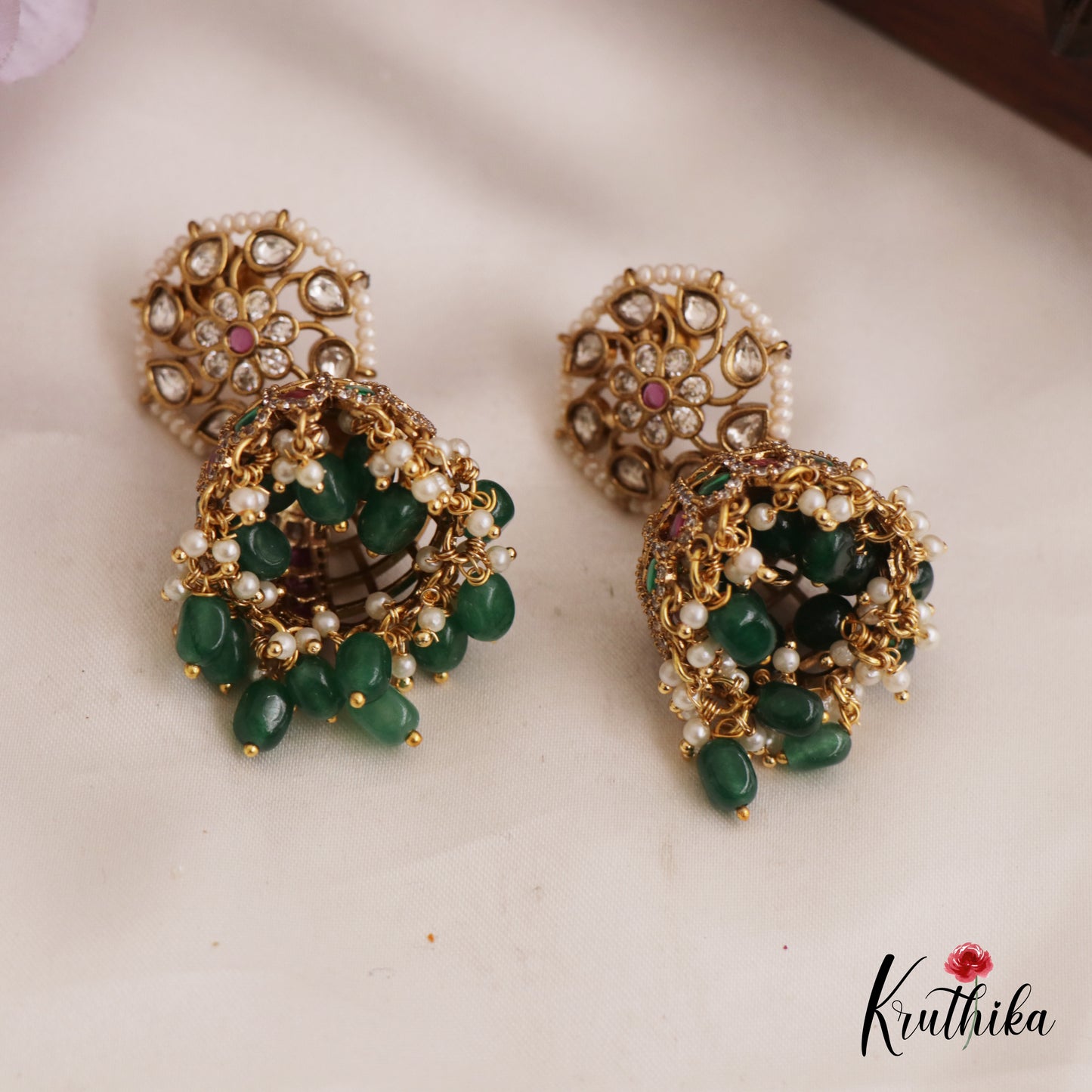Sparkling Pearl Border Floral Motifs Jhumka With Bead Drops E986 (Available In 2 Colors)