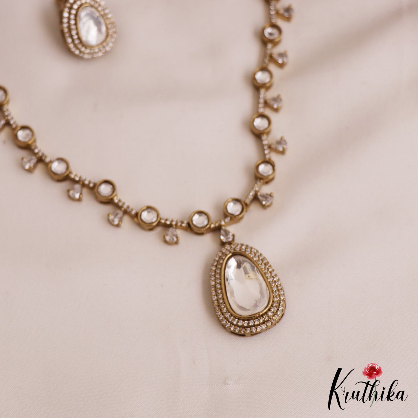 Elegant Teardrop Motifs Diamond-Finish Gold-Tone AD Necklace NC2762 (Available In 2 Colors)