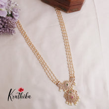 Elegant Three Layer Pearls Haaram with AD peacock pendant LH1890