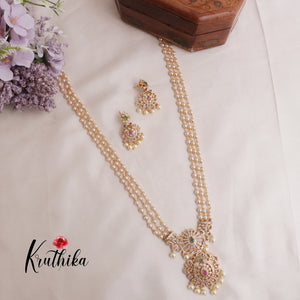 Elegant Three Layer Pearls Haaram with AD peacock pendant LH1890