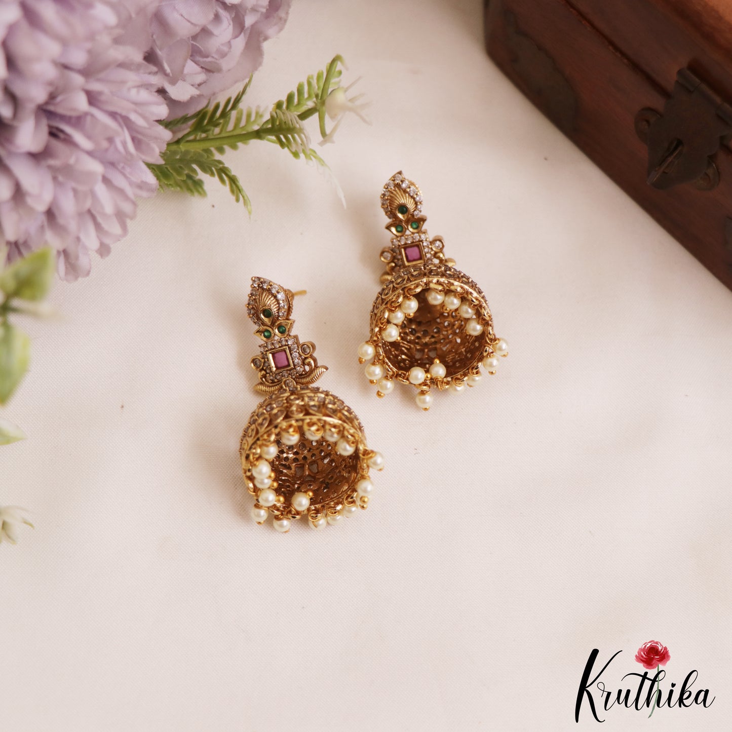 Elegant Leaf Motifs Gold-Tone AD Jhumka With Pearl Drops E1054