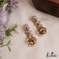 Sparkling Floral Motifs AD Jhumkas With Pearl Drops E1107 (Available In 4 Colors)