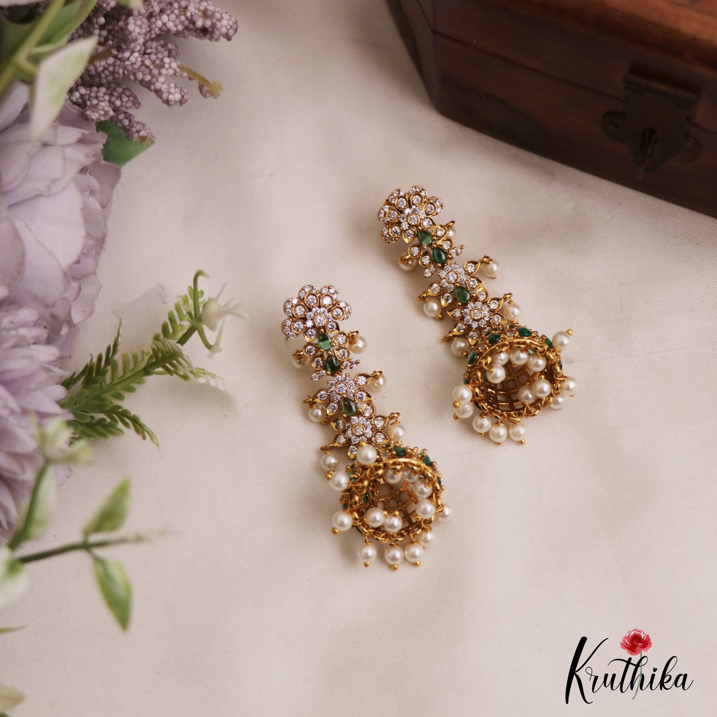 Sparkling Floral Motifs AD Jhumkas With Pearl Drops E1107 (Available In 4 Colors)