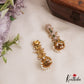 Sparkling Floral Motifs AD Jhumkas With Pearl Drops E1107 (Available In 4 Colors)