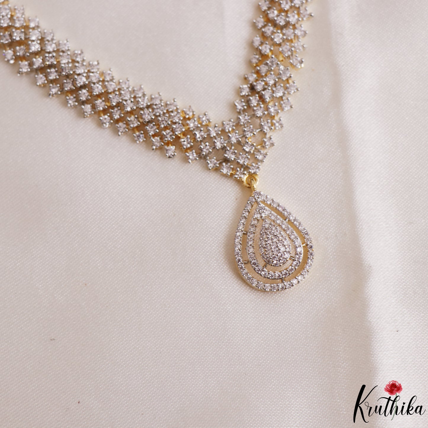 Elegant Teardrop Motifs Diamond-Finish Gold-Tone CZ Necklace NC3246