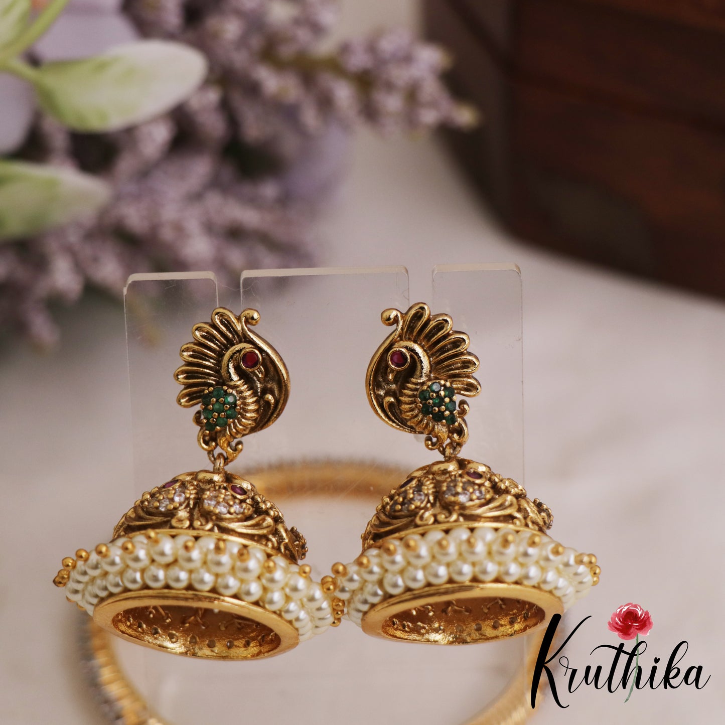 Beautiful Peacock Motifs Gold-Tone Jhumkas With Pearl Border E1072