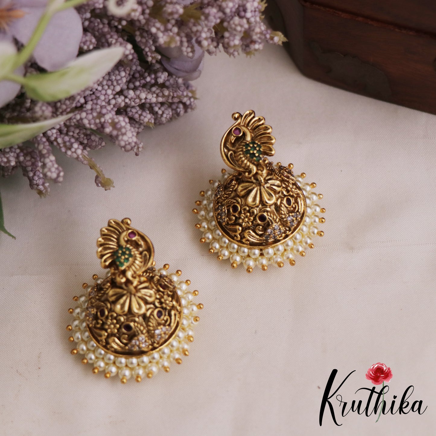Beautiful Peacock Motifs Gold-Tone Jhumkas With Pearl Border E1072