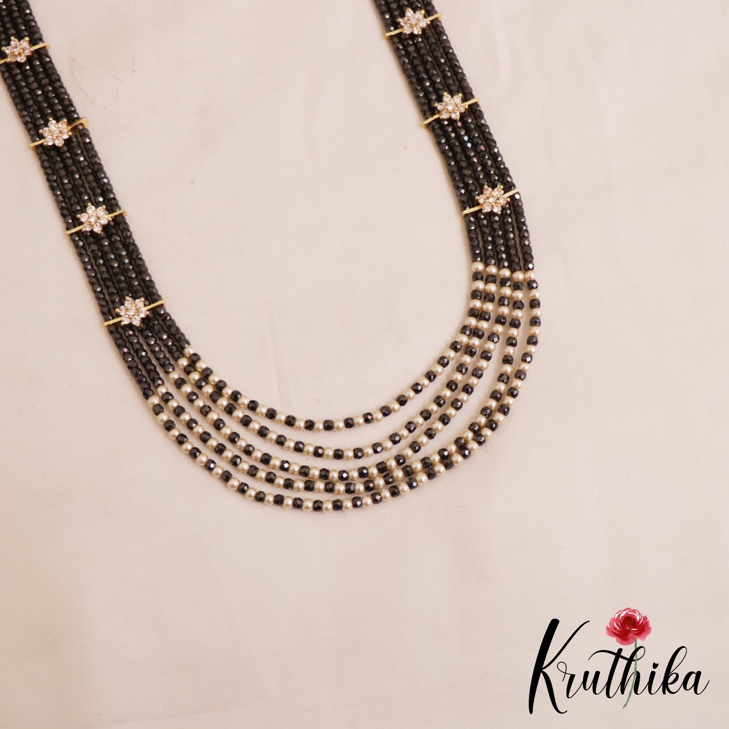 Sparkling Multi Layered crystal & Pearl statement Haaram with floral accents LH2081