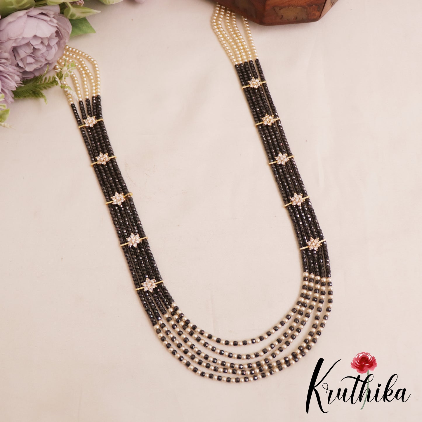 Sparkling Multi Layered crystal & Pearl statement Haaram with floral accents LH2081