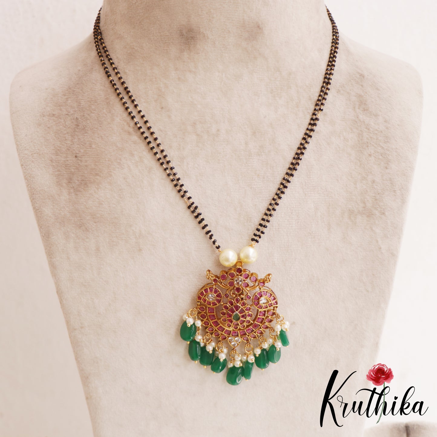 Classic Floral Mango Motifs Double Layered Mangalsutra With Green Bead Drops NC2905
