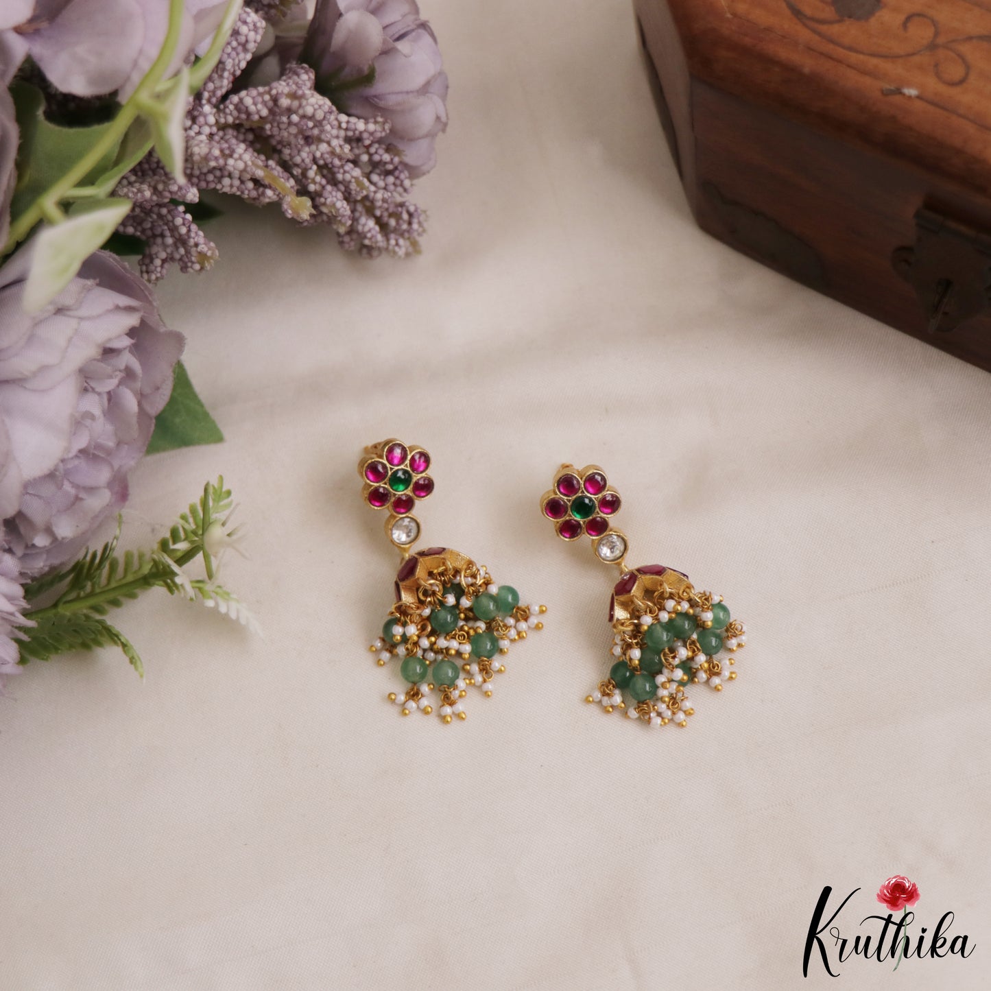 Trendy Floral Motifs Jadau Jhumkas With Green Bead Drops E1082