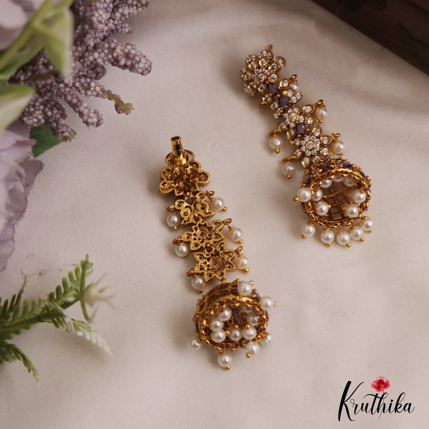 Sparkling Floral Motifs AD Jhumkas With Pearl Drops E1107 (Available In 4 Colors)