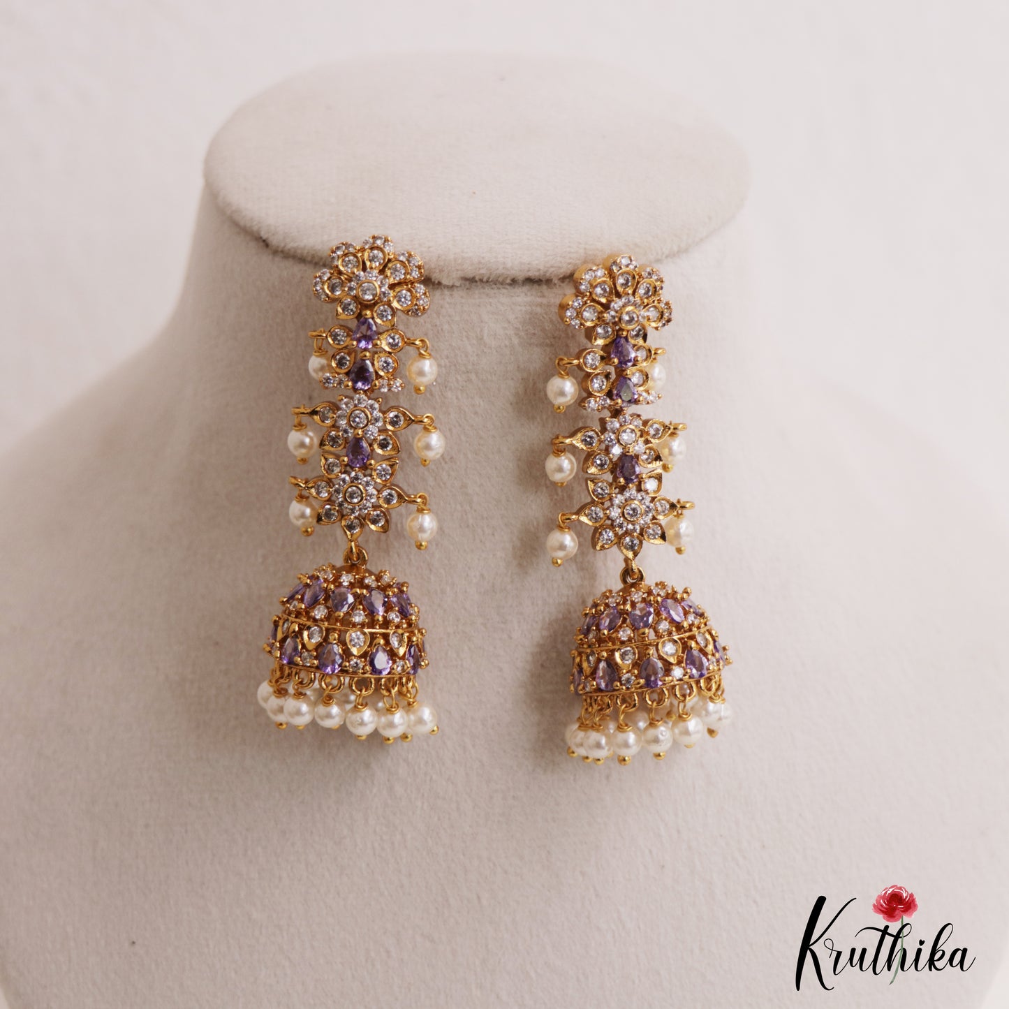 Sparkling Floral Motifs AD Jhumkas With Pearl Drops E1107 (Available In 4 Colors)