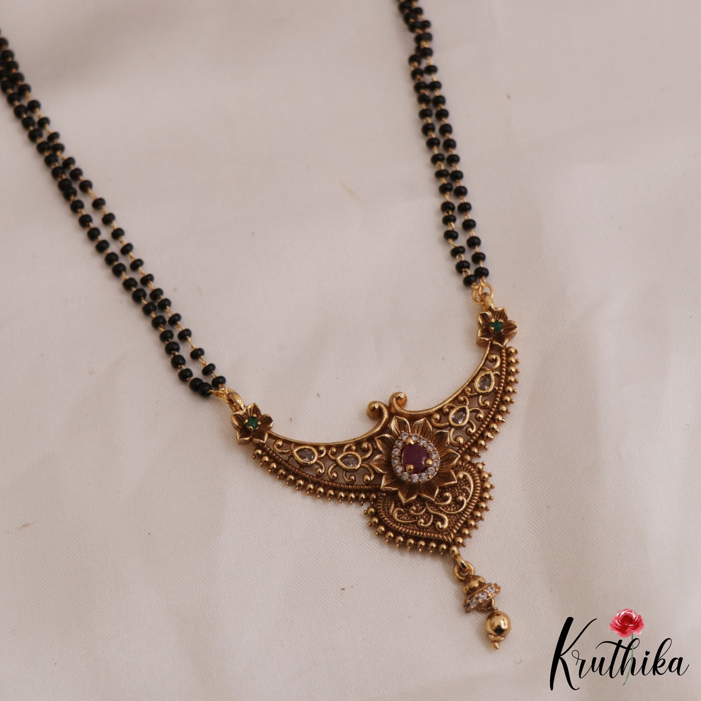 Beautiful Floral Teardrop Motifs Mangalsutra with Earrings Set NC2635