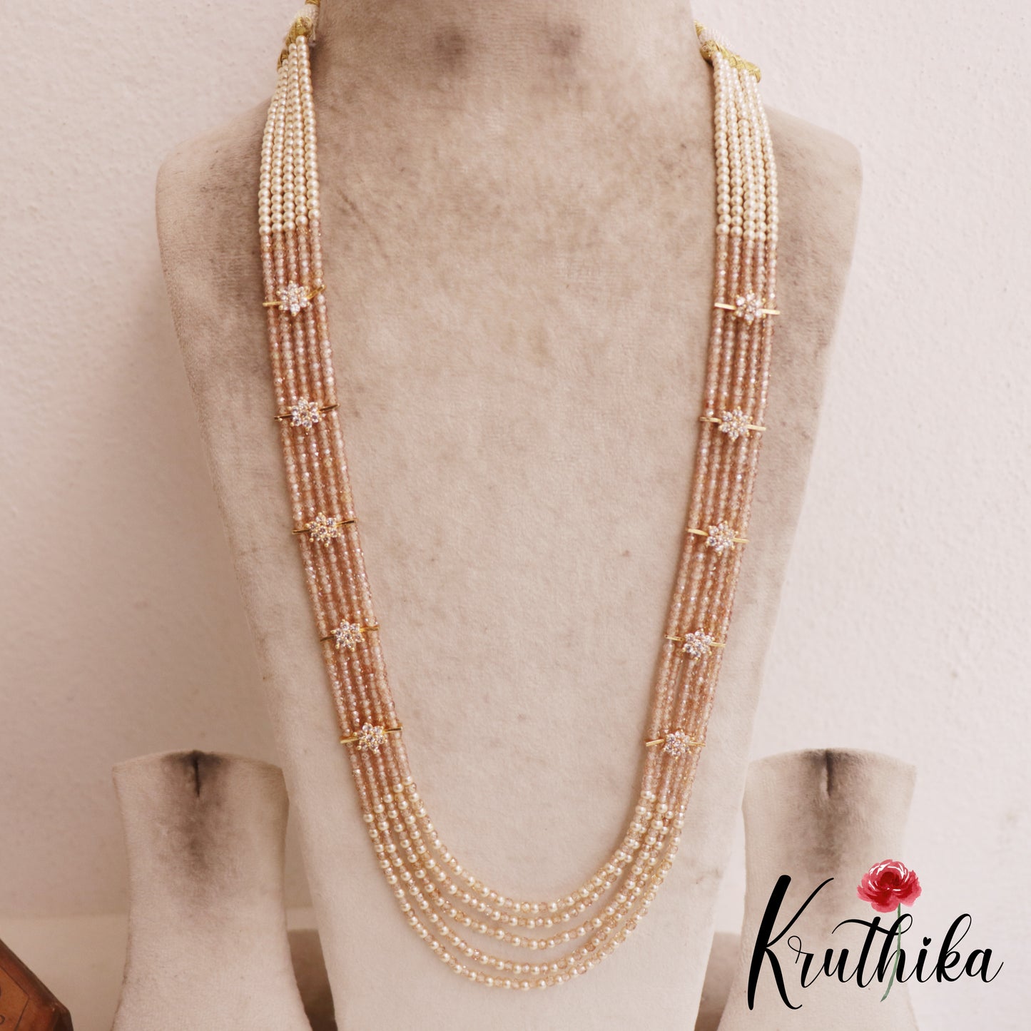 Sparkling Multi Layered crystal & Pearl statement Haaram with floral accents LH2081
