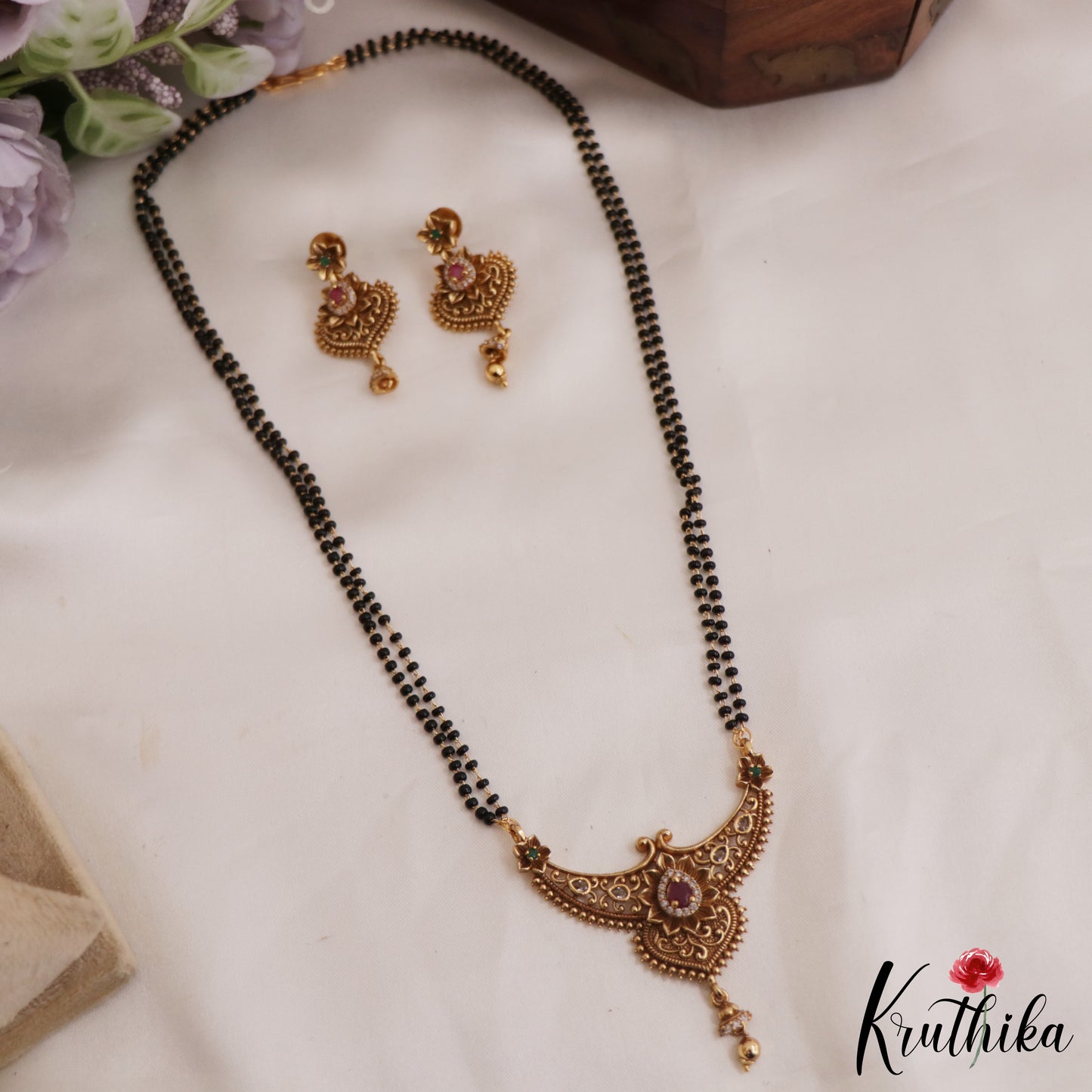 Beautiful Floral Teardrop Motifs Mangalsutra with Earrings Set NC2635