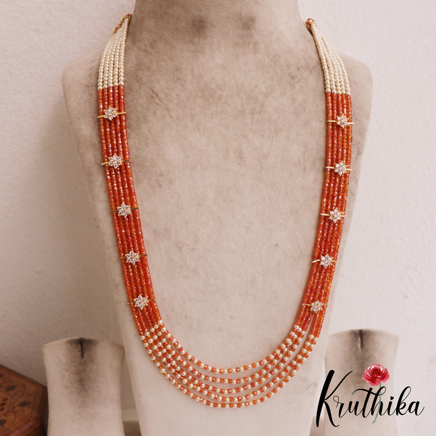 Sparkling Multi Layered crystal & Pearl statement Haaram with floral accents LH2081