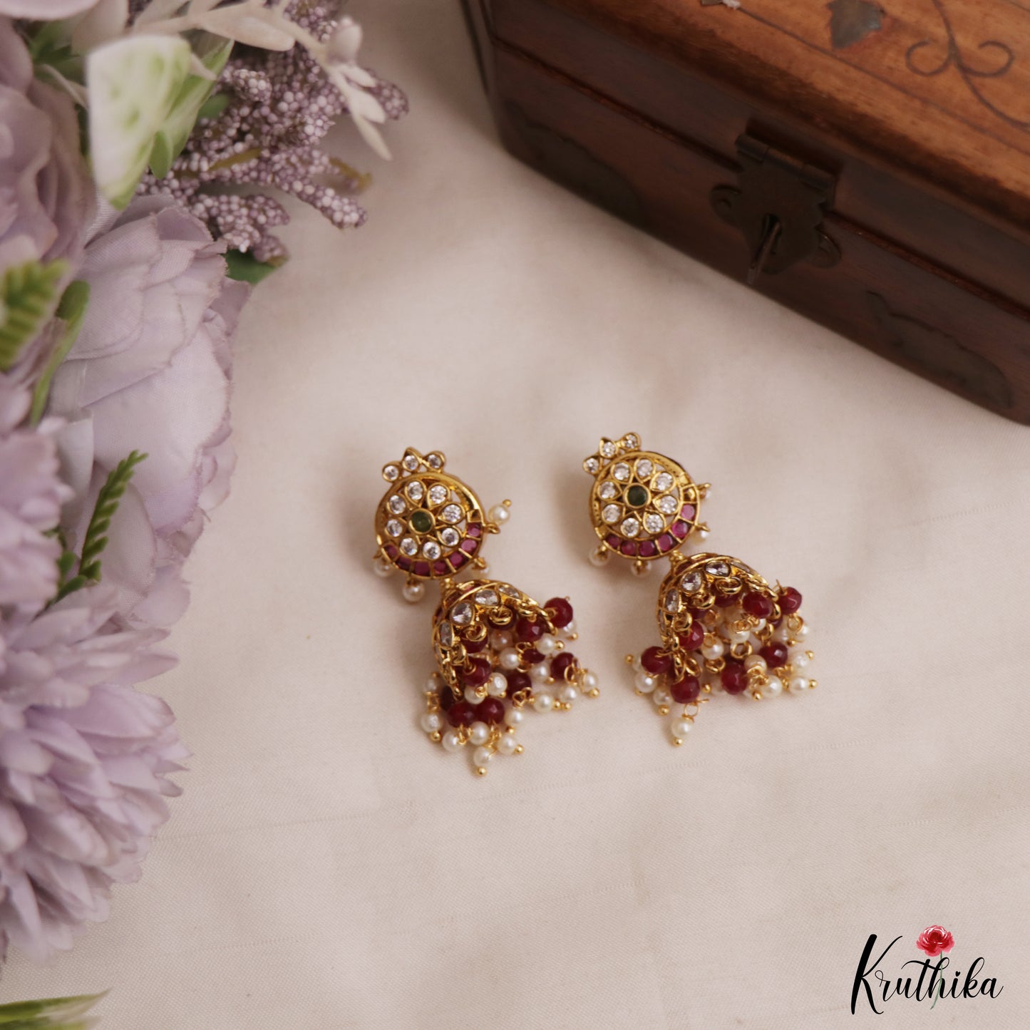 Trendy Floral Motifs Kemp Jhumas With Pearl Bead Drops E1147