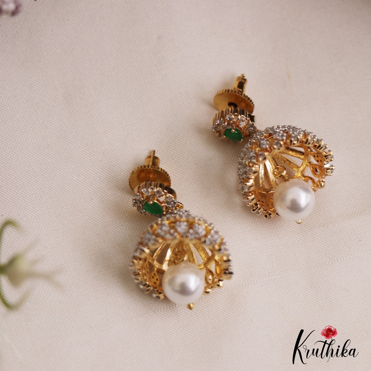 Pretty Teardrop Motifs AD Jhumkas With Pearl Drop E1097 (Available In 3 Colors)
