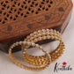 Pretty Floral Motifs Diamond-Finish Gold-Tone AD Bangles B518 (Set Of 4)
