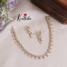 Trendy Sparkling American Diamonds Gold Finish NC2024