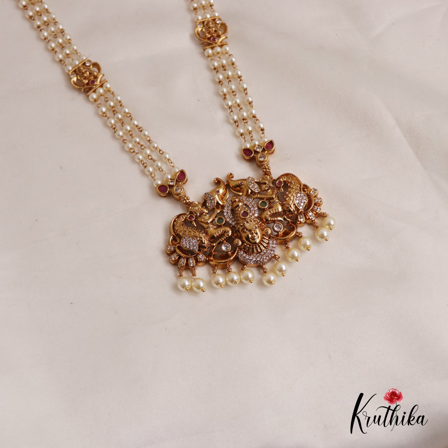 Traditional Triple Layered Pearl Strands With Lakshmi Peacock Motifs Pendant Haaram LH2010