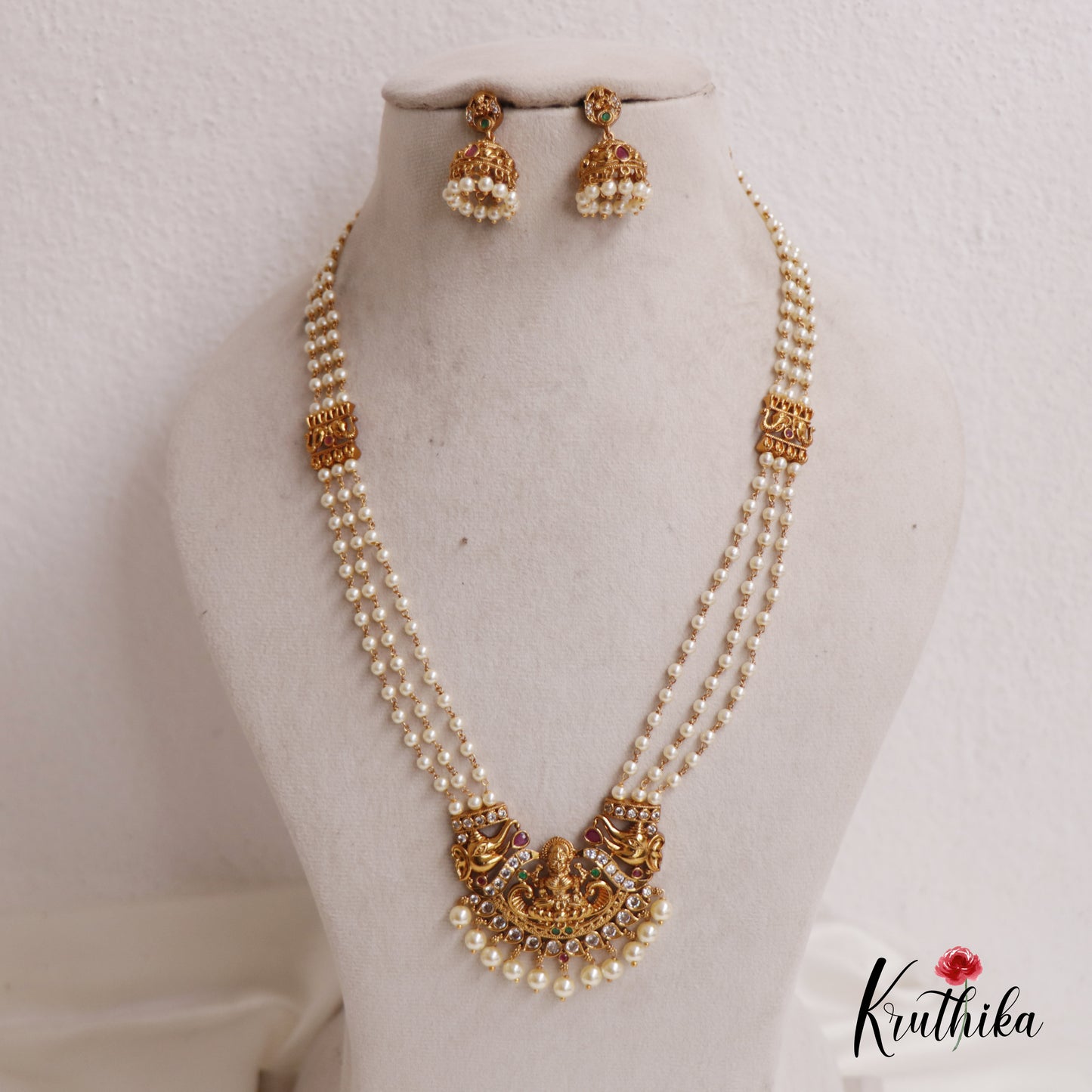 Classic Triple Layered Pearl Strands With Lakshmi Elephant Motifs Pendant Haaram LH2014