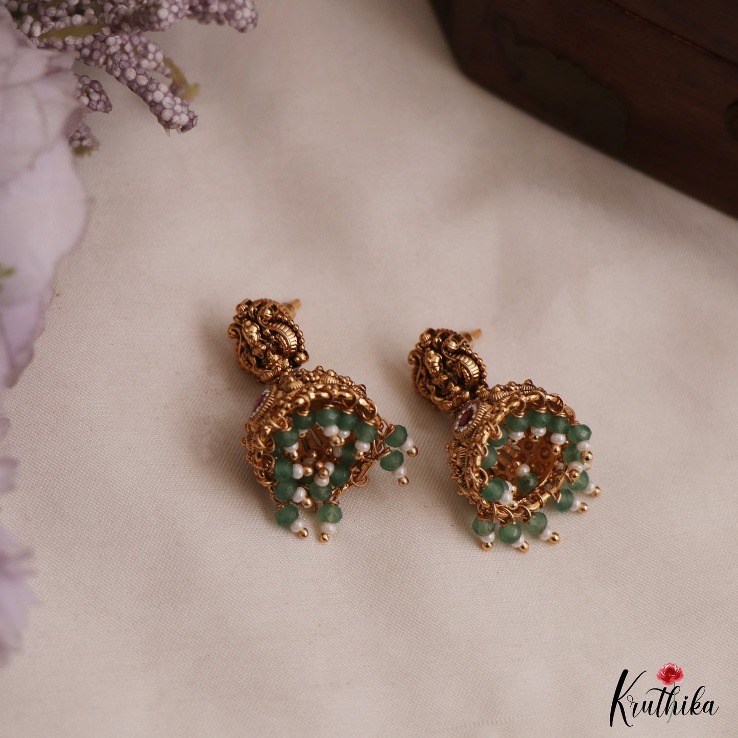 Classic Antique Lakshmi Motifs Temple Jhumkas With Green Bead Drops E1157