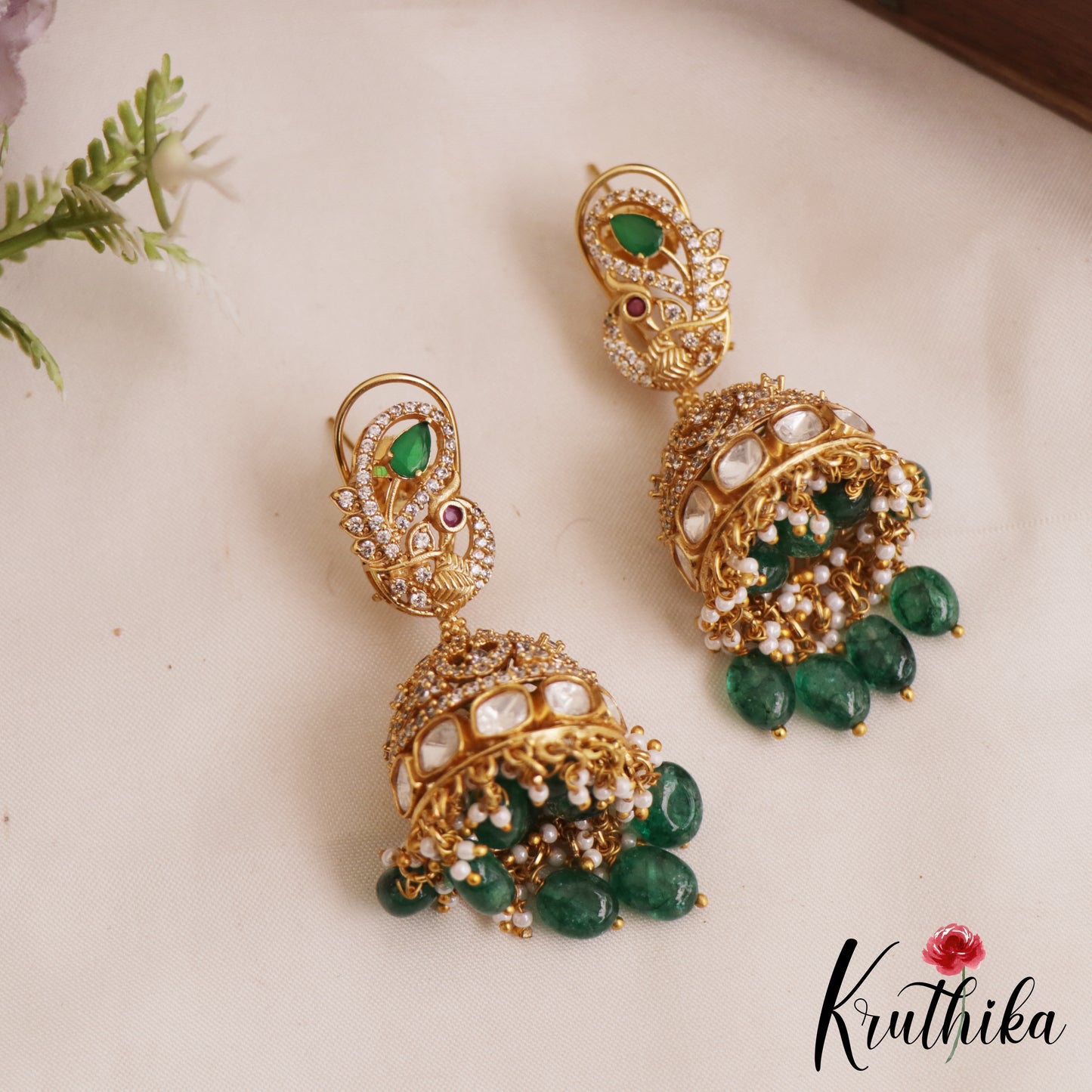 Premium AD Peacock Motifs Polki Jhumka With Green Bead Drops E1036