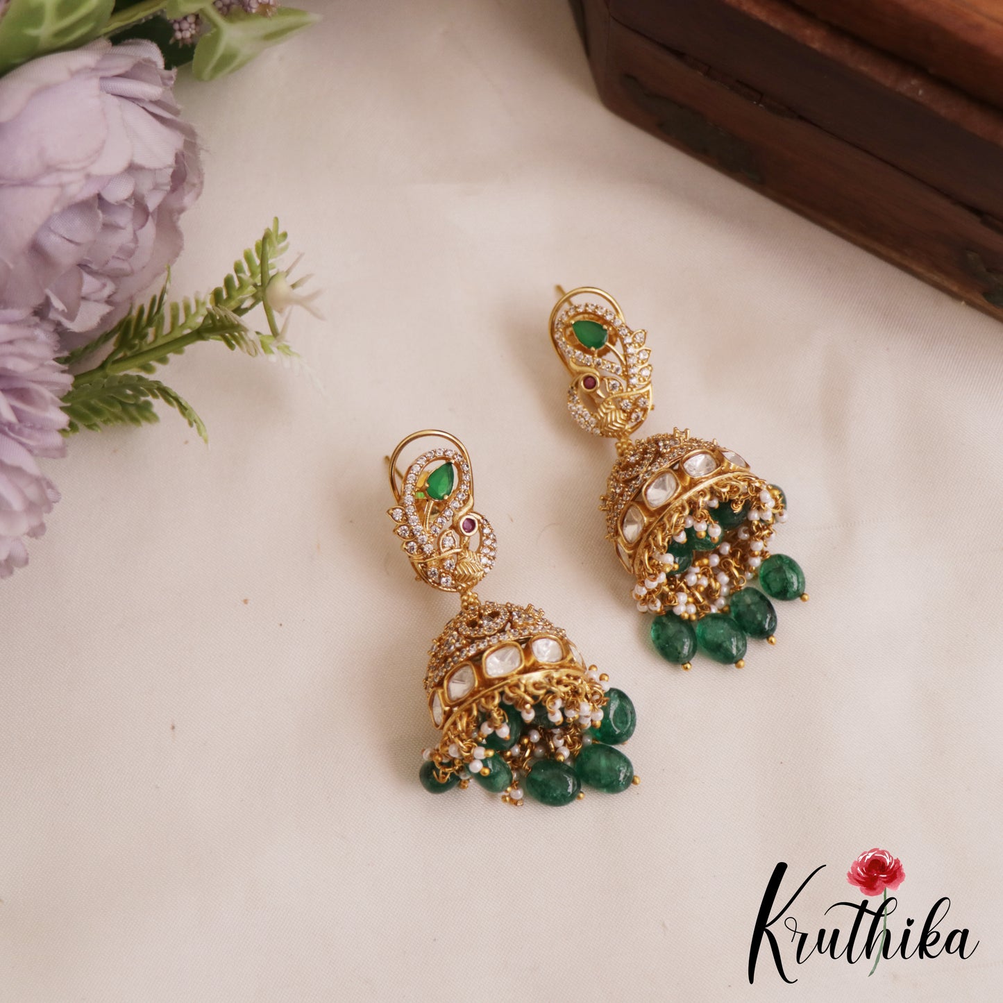 Premium AD Peacock Motifs Polki Jhumka With Green Bead Drops E1036
