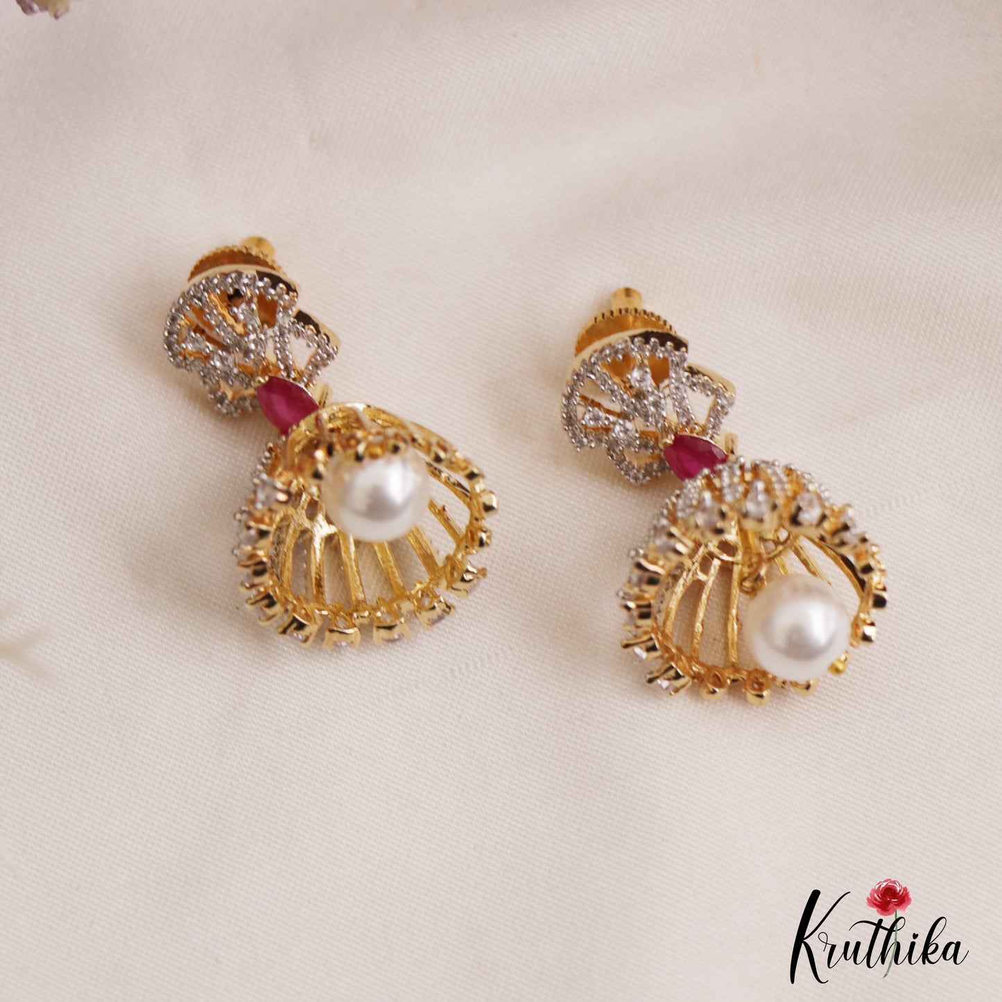 Trendy Gold-Tone AD Jhumkas With Pearl Drop E1108 (Available In 3 Colors)