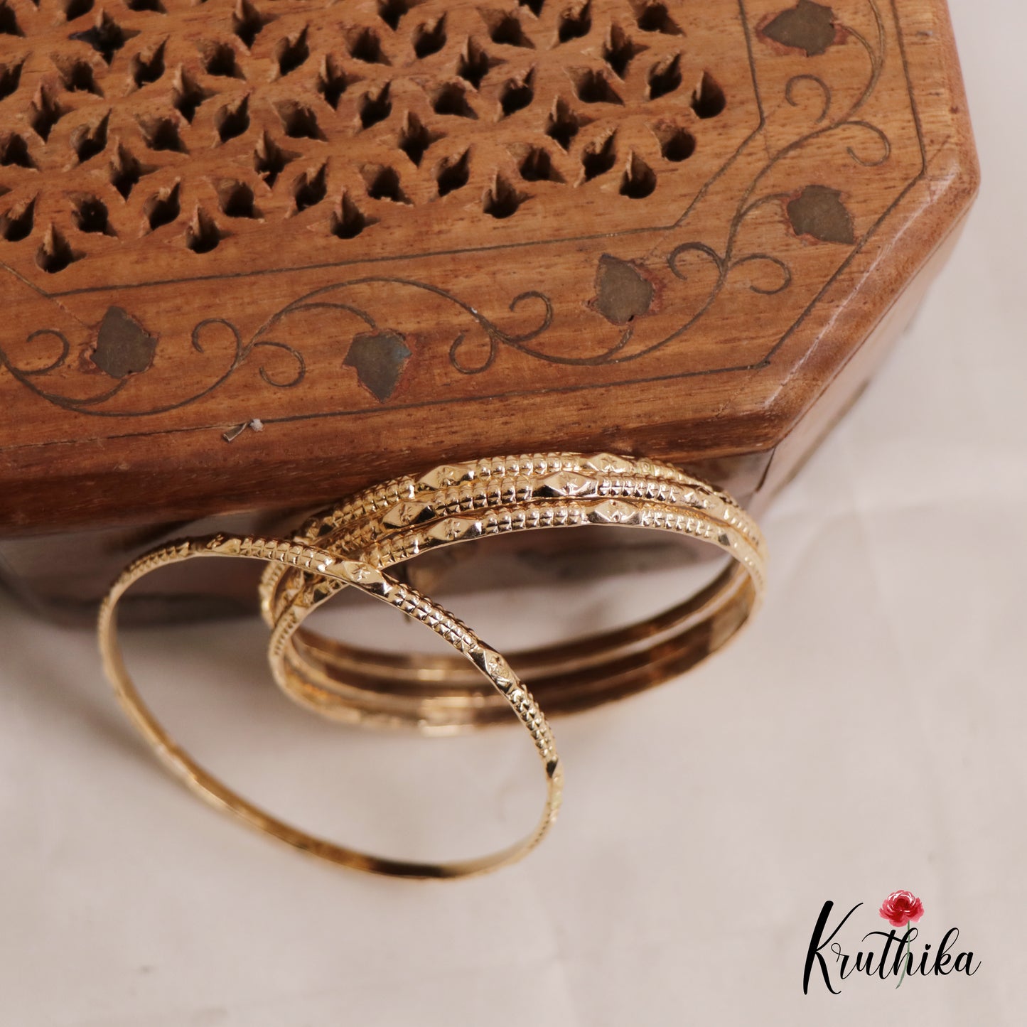 Beautiful Floral Panchaloham Daily Wear Bangles B384 (Set of 4)