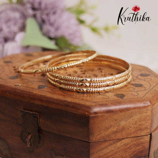 Beautiful Floral Panchaloham Daily Wear Bangles B384 (Set of 4)