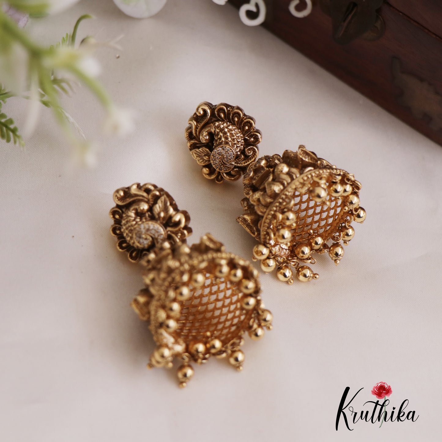 Beautiful Lakshmi Peacock Jhumkas with Golden Beads Drops E902
