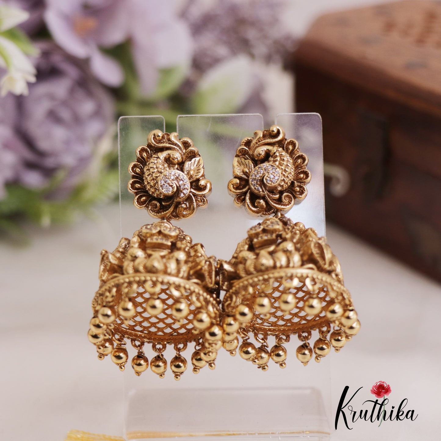Beautiful Lakshmi Peacock Jhumkas with Golden Beads Drops E902